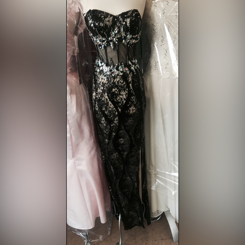 Elegant Black Sequin Gown with Floral Accents